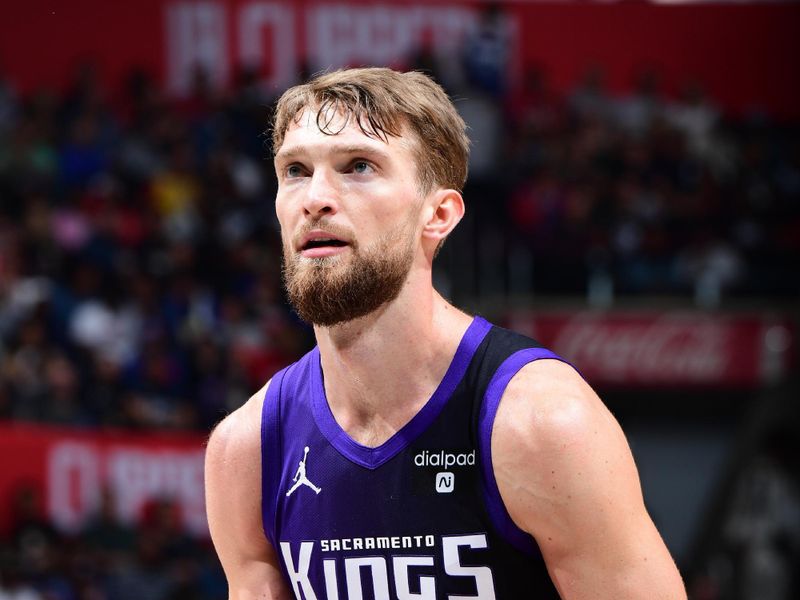 LOS ANGELES, CA - FEBRUARY 25: Domantas Sabonis #10 of the Sacramento Kings shoots the ball during the game against the LA Clippers on February 25, 2024 at Crypto.Com Arena in Los Angeles, California. NOTE TO USER: User expressly acknowledges and agrees that, by downloading and/or using this Photograph, user is consenting to the terms and conditions of the Getty Images License Agreement. Mandatory Copyright Notice: Copyright 2024 NBAE (Photo by Adam Pantozzi/NBAE via Getty Images)