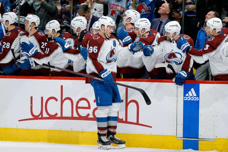 Feb 24, 2024; Denver, Colorado, USA; Colorado Avalanche right wing Mikko Rantanen (96) celebrates with the bench after his goal in the third period against the Toronto Maple Leafs at Ball Arena. Mandatory Credit: Isaiah J. Downing-USA TODAY Sports