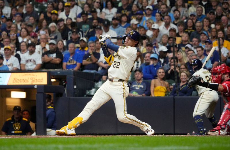 Sep 18, 2025; Milwaukee, Wisconsin, USA; Milwaukee Brewers outfielder Christian Yelich (22) gets a hit against the Los Angeles Angels in the seventh inning at American Family Field. Mandatory Credit: Michael McLoone-Imagn Images