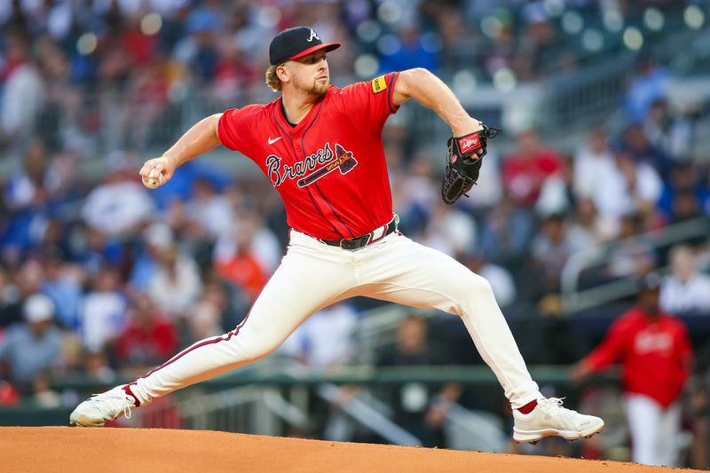 Sep 13, 2024; Atlanta, Georgia, USA; Atlanta Braves starting pitcher Spencer Schwellenbach (56) throws against the Los Angeles Dodgers in the first inning at Truist Park. Mandatory Credit: Brett Davis-Imagn Images
