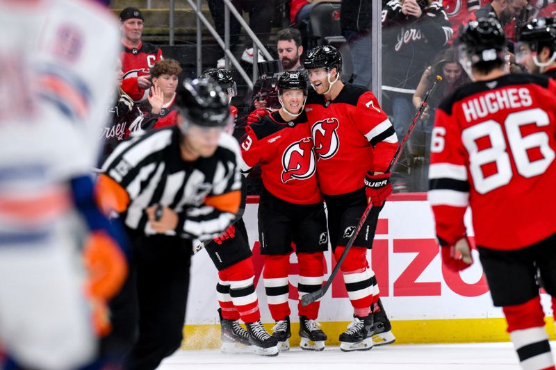 Oct 18, 2025; Newark, New Jersey, USA; New Jersey Devils left wing Jesper Bratt (63) celebrates with teammates after scoring a goal against the Edmonton Oilers during the second period at Prudential Center. Mandatory Credit: John Jones-Imagn Images