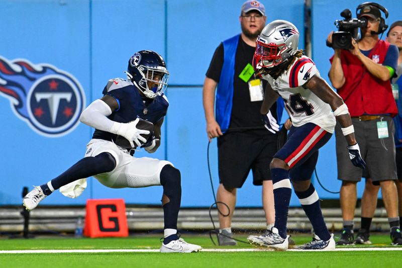 Tennessee Titans wide receiver Kearis Jackson scores a touchdown in the second half of an NFL preseason football game against the New England Patriots Friday, Aug. 25, 2023, in Nashville, Tenn. (AP Photo/John Amis)