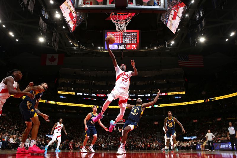 TORONTO, CANADA - NOVEMBER 18: Chris Boucher #25 of the Toronto Raptors drives to the basket during the game against the Indiana Pacers on November 18, 2024 at the Scotiabank Arena in Toronto, Ontario, Canada.  NOTE TO USER: User expressly acknowledges and agrees that, by downloading and or using this Photograph, user is consenting to the terms and conditions of the Getty Images License Agreement.  Mandatory Copyright Notice: Copyright 2024 NBAE (Photo by Vaughn Ridley/NBAE via Getty Images)