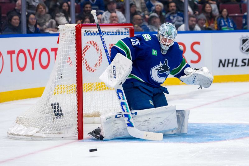 Jan 16, 2025; Vancouver, British Columbia, CAN; Vancouver Canucks goalie Thatcher Demko (35) makes a save against the Los Angeles Kings in the third period at Rogers Arena. Mandatory Credit: Bob Frid-Imagn Images