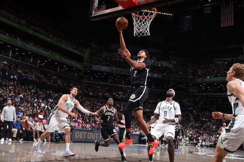 BROOKLYN, NY - DECEMBER 8: Cameron Johnson #2 of the Brooklyn Nets shoots the ball during the game against the Milwaukee Bucks on December 8, 2024 at Barclays Center in Brooklyn, New York. NOTE TO USER: User expressly acknowledges and agrees that, by downloading and or using this Photograph, user is consenting to the terms and conditions of the Getty Images License Agreement. Mandatory Copyright Notice: Copyright 2024 NBAE (Photo by Nathaniel S. Butler/NBAE via Getty Images)