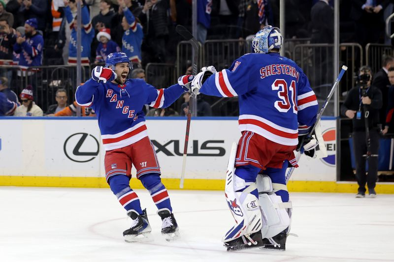 Dec 20, 2025; New York, New York, USA; New York Rangers center Vincent Trocheck (16) celebrates with goaltender Igor Shesterkin (31) after defeating the Philadelphia Flyers in a shootout at Madison Square Garden. Mandatory Credit: Brad Penner-Imagn Images