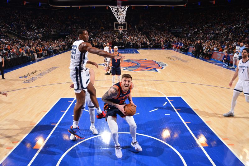 NEW YORK, NY - FEBRUARY 6: Isaiah Hartenstein #55 of the New York Knicks drives to the basket during the game against the Memphis Grizzlies on February 6, 2024 at Madison Square Garden in New York City, New York.  NOTE TO USER: User expressly acknowledges and agrees that, by downloading and or using this photograph, User is consenting to the terms and conditions of the Getty Images License Agreement. Mandatory Copyright Notice: Copyright 2024 NBAE  (Photo by Jesse D. Garrabrant/NBAE via Getty Images)