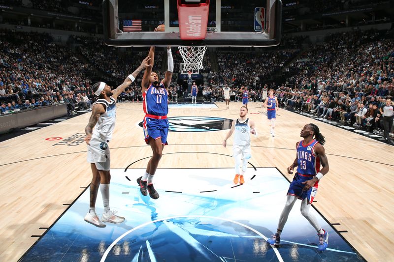 MINNEAPOLIS, MN -  NOVEMBER 27: Issac Jones #17 of the Sacramento Kings drives to the basket during the game against the Minnesota Timberwolves on November 27, 2024 at Target Center in Minneapolis, Minnesota. NOTE TO USER: User expressly acknowledges and agrees that, by downloading and or using this Photograph, user is consenting to the terms and conditions of the Getty Images License Agreement. Mandatory Copyright Notice: Copyright 2024 NBAE (Photo by David Sherman/NBAE via Getty Images)