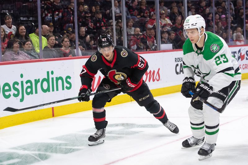 Feb 22, 2024; Ottawa, Ontario, CAN; Ottawa Senators center Shane Pinto (57) and Dallas Stars defenseman Esa Lindell (23) chase the puck in the first period at the Canadian Tire Centre. Mandatory Credit: Marc DesRosiers-USA TODAY Sports