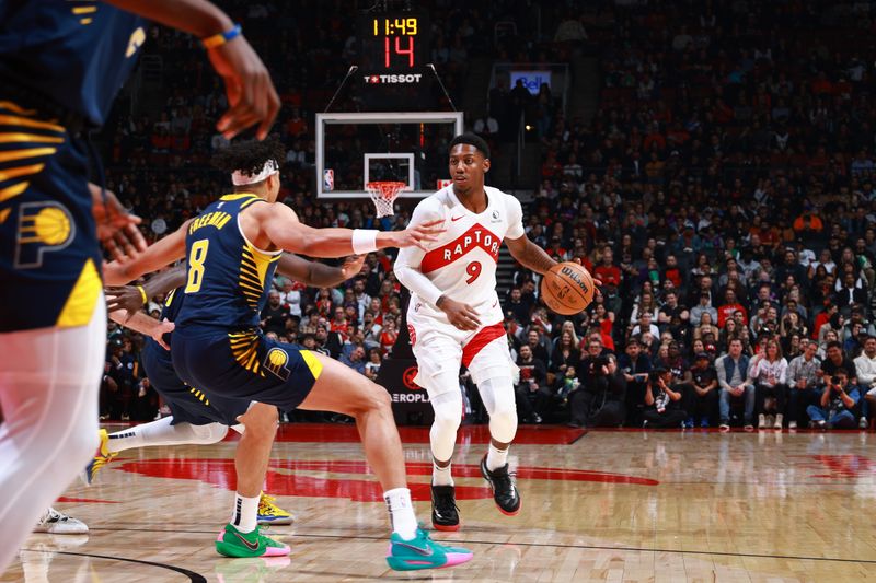 TORONTO, CANADA - NOVEMBER 18: RJ Barrett #9 of the Toronto Raptors looks on during the game against the Indiana Pacers on November 18, 2024 at the Scotiabank Arena in Toronto, Ontario, Canada.  NOTE TO USER: User expressly acknowledges and agrees that, by downloading and or using this Photograph, user is consenting to the terms and conditions of the Getty Images License Agreement.  Mandatory Copyright Notice: Copyright 2024 NBAE (Photo by Vaughn Ridley/NBAE via Getty Images)