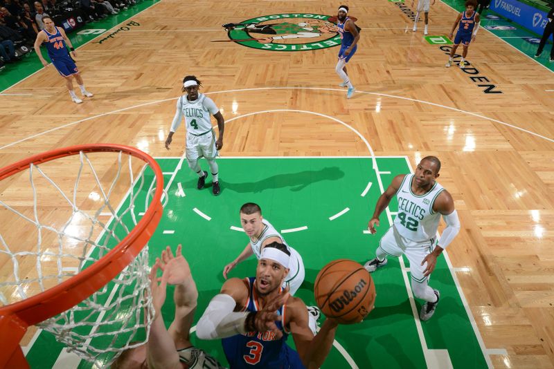 BOSTON, MA - APRIL 11: Josh Hart #3 of the New York Knicks drives to the basket during the game against the Boston Celtics on April 11, 2024 at the TD Garden in Boston, Massachusetts. NOTE TO USER: User expressly acknowledges and agrees that, by downloading and or using this photograph, User is consenting to the terms and conditions of the Getty Images License Agreement. Mandatory Copyright Notice: Copyright 2024 NBAE  (Photo by Brian Babineau/NBAE via Getty Images)