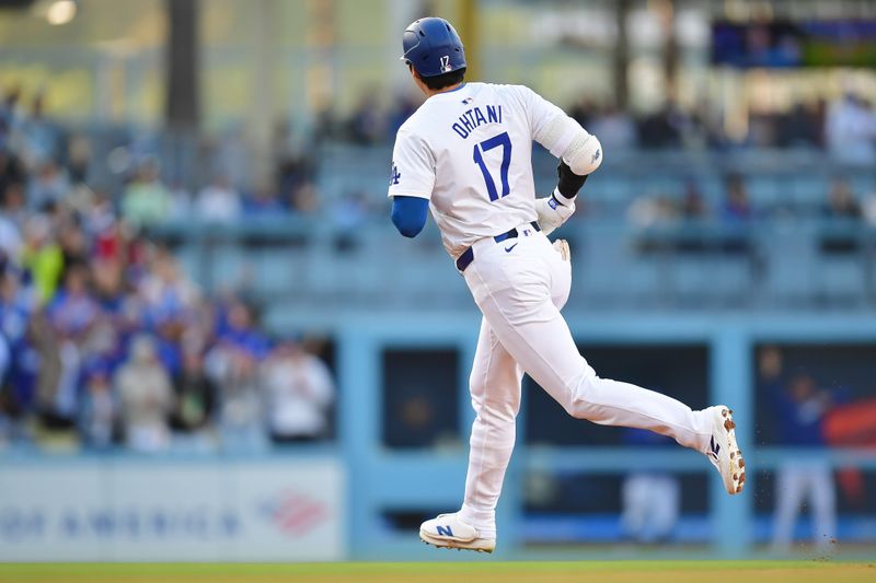 May 4, 2024; Los Angeles, California, USA; Los Angeles Dodgers designated hitter Shohei Ohtani (17) runs the bases after hitting a solo home run against the Atlanta Braves during the third inning at Dodger Stadium. Mandatory Credit: Gary A. Vasquez-USA TODAY Sports