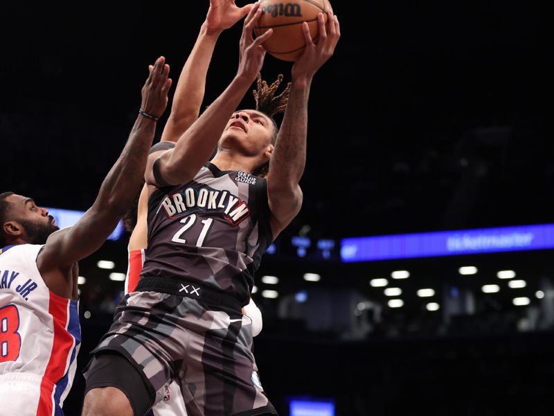 BROOKLYN, NY - JANUARY 8: Noah Clowney #21 of the Brooklyn Nets  drives to the basket during the game against the Detroit Pistons on January 8, 2025 at Barclays Center in Brooklyn, New York. NOTE TO USER: User expressly acknowledges and agrees that, by downloading and or using this Photograph, user is consenting to the terms and conditions of the Getty Images License Agreement. Mandatory Copyright Notice: Copyright 2025 NBAE (Photo by Brandon Todd/NBAE via Getty Images)