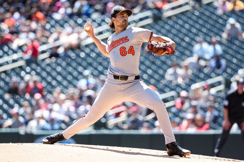 May 8, 2025; Minneapolis, Minnesota, USA; Baltimore Orioles starting pitcher Dean Kremer (64) delivers a pitch against the Minnesota Twins during the first inning at Target Field. Mandatory Credit: Matt Krohn-Imagn Images