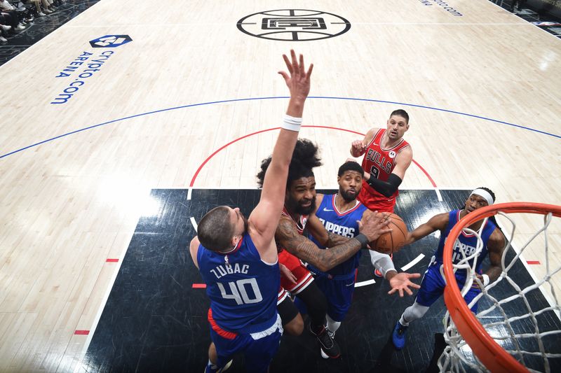 LOS ANGELES, CA - MARCH 9: Coby White #0 of the Chicago Bulls shoots the ball during the game against the LA Clippers on March 9, 2024 at Crypto.Com Arena in Los Angeles, California. NOTE TO USER: User expressly acknowledges and agrees that, by downloading and/or using this Photograph, user is consenting to the terms and conditions of the Getty Images License Agreement. Mandatory Copyright Notice: Copyright 2024 NBAE (Photo by Adam Pantozzi/NBAE via Getty Images)