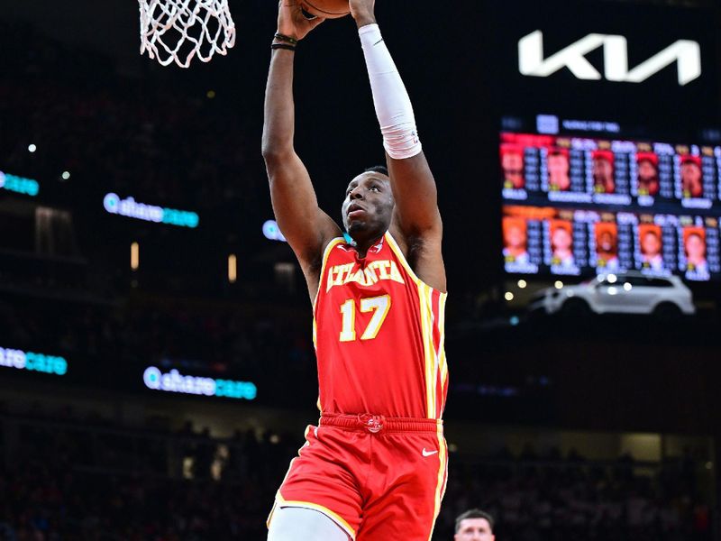 ATLANTA, GA - FEBRUARY 2: Onyeka Okongwu #17 of the Atlanta Hawks dunks the ball during the game against the Phoenix Suns on February 2, 2024 at State Farm Arena in Atlanta, Georgia.  NOTE TO USER: User expressly acknowledges and agrees that, by downloading and/or using this Photograph, user is consenting to the terms and conditions of the Getty Images License Agreement. Mandatory Copyright Notice: Copyright 2024 NBAE (Photo by Adam Hagy/NBAE via Getty Images)