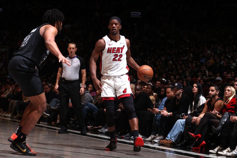 BROOKLYN, NY - JANUARY 15: Jimmy Butler #22 of the Miami Heat dribbles the ball during the game against the Brooklyn Nets on January 15, 2024 at Barclays Center in Brooklyn, New York. NOTE TO USER: User expressly acknowledges and agrees that, by downloading and or using this Photograph, user is consenting to the terms and conditions of the Getty Images License Agreement. Mandatory Copyright Notice: Copyright 2024 NBAE (Photo by Nathaniel S. Butler/NBAE via Getty Images)