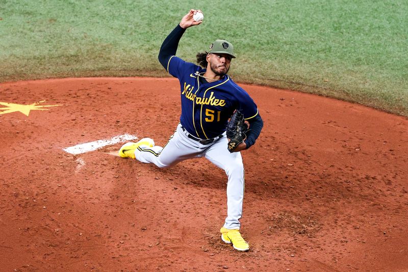 May 21, 2023; St. Petersburg, Florida, USA;  Milwaukee Brewers starting pitcher Freddy Peralta (51) throws a pitch against the Tampa Bay Rays in the fourth inning at Tropicana Field. Mandatory Credit: Nathan Ray Seebeck-USA TODAY Sports