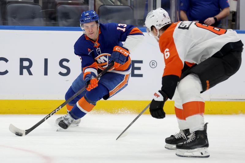 Jan 24, 2025; Elmont, New York, USA; New York Islanders center Mathew Barzal (13) controls the puck against Philadelphia Flyers defenseman Travis Sanheim (6) during the second period at UBS Arena. Mandatory Credit: Brad Penner-Imagn Images