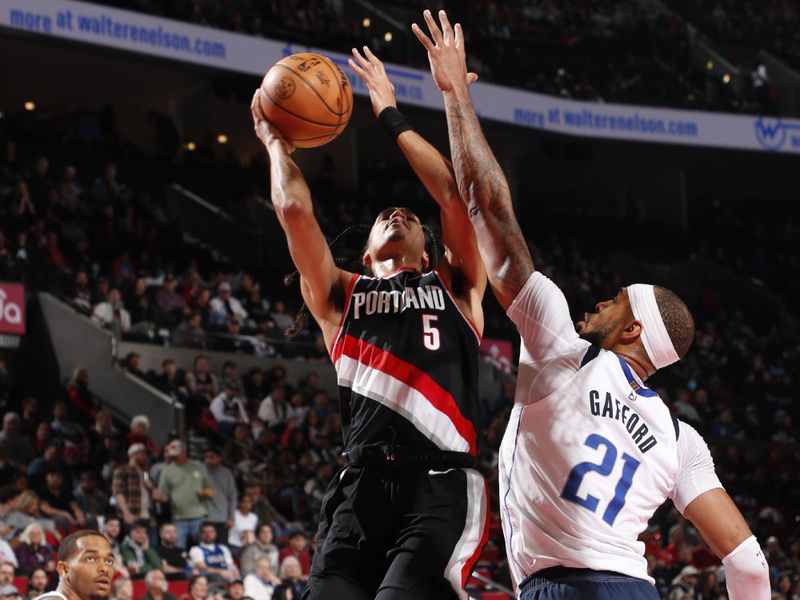 PORTLAND, OR - DECEMBER 1: Dalano Banton #5 of the Portland Trail Blazers drives to the basket during the game against the Dallas Mavericks on December 1, 2024 at the Moda Center Arena in Portland, Oregon. NOTE TO USER: User expressly acknowledges and agrees that, by downloading and or using this photograph, user is consenting to the terms and conditions of the Getty Images License Agreement. Mandatory Copyright Notice: Copyright 2024 NBAE (Photo by Cameron Browne/NBAE via Getty Images)