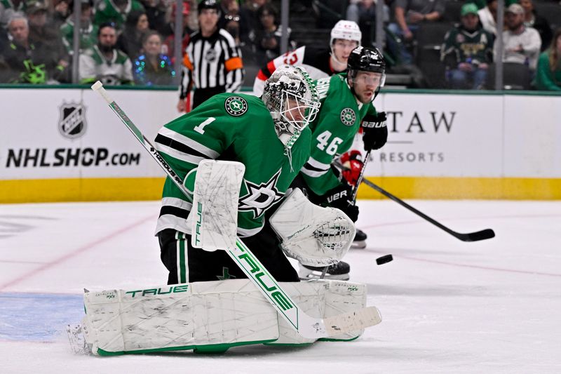 Mar 4, 2025; Dallas, Texas, USA; Dallas Stars goaltender Casey DeSmith (1) makes a save on a New Jersey Devils shot during the third period at the American Airlines Center. Mandatory Credit: Jerome Miron-Imagn Images