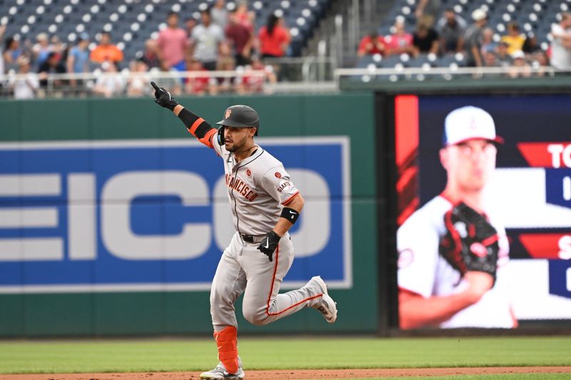 Aug 6, 2024; Washington, District of Columbia, USA; San San Francisco Giants left fielder Michael Conforto (8) gestures as he runs the bases after hitting a three run home run against the Washington Nationals during the first inning at Nationals Park. Mandatory Credit: Rafael Suanes-USA TODAY Sports