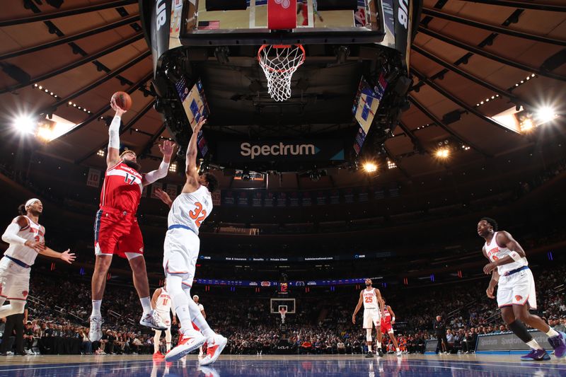 NEW YORK, NY - OCTOBER 9: Jonas Valanciunas #17 of the Washington Wizards drives to the basket during the game against the New York Knicks during the 2024 NBA Preseason on October 9, 2024 at Madison Square Garden in New York City, New York.  NOTE TO USER: User expressly acknowledges and agrees that, by downloading and or using this photograph, User is consenting to the terms and conditions of the Getty Images License Agreement. Mandatory Copyright Notice: Copyright 2024 NBAE  (Photo by Nathaniel S. Butler/NBAE via Getty Images)