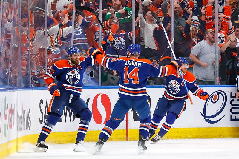 May 29, 2024; Edmonton, Alberta, CAN;   The Edmonton Oilers celebrate a goal scored by forward Leon Draisaitl (29) during the second period against the Dallas Stars in game four of the Western Conference Final of the 2024 Stanley Cup Playoffs at Rogers Place. Mandatory Credit: Perry Nelson-USA TODAY Sports