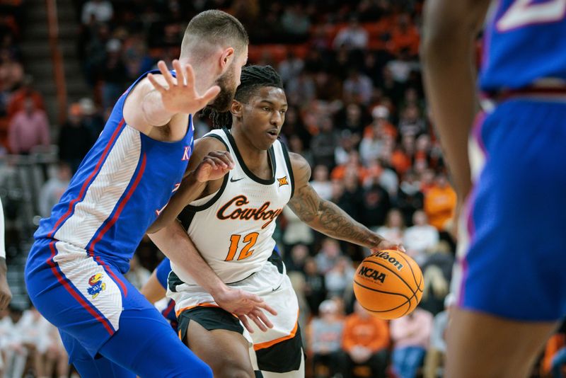 Jan 16, 2024; Stillwater, Oklahoma, USA; Oklahoma State Cowboys guard Javon Small (12) drives to the basket during the first half against the Kansas Jayhawks at Gallagher-Iba Arena. Mandatory Credit: William Purnell-USA TODAY Sports