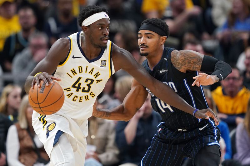 INDIANAPOLIS, INDIANA - NOVEMBER 06: Pascal Siakam #43 of the Indiana Pacers dribbles the ball while being guarded by Gary Harris #14 of the Orlando Magic in the first quarter at Gainbridge Fieldhouse on November 06, 2024 in Indianapolis, Indiana. NOTE TO USER: User expressly acknowledges and agrees that, by downloading and or using this photograph, User is consenting to the terms and conditions of the Getty Images License Agreement. (Photo by Dylan Buell/Getty Images)