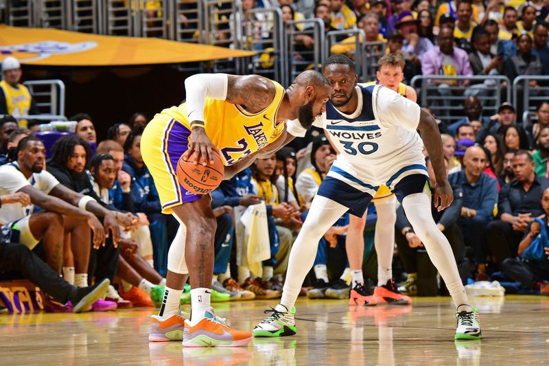 LOS ANGELES, CA - OCTOBER 22: Julius Randle #30 of the Minnesota Timberwolves plays defense against LeBron James #23 of the Los Angeles Lakers during the game against the Los Angeles Lakers on October 22, 2024 at Crypto.Com Arena in Los Angeles, California. NOTE TO USER: User expressly acknowledges and agrees that, by downloading and/or using this Photograph, user is consenting to the terms and conditions of the Getty Images License Agreement. Mandatory Copyright Notice: Copyright 2024 NBAE (Photo by Adam Pantozzi/NBAE via Getty Images)