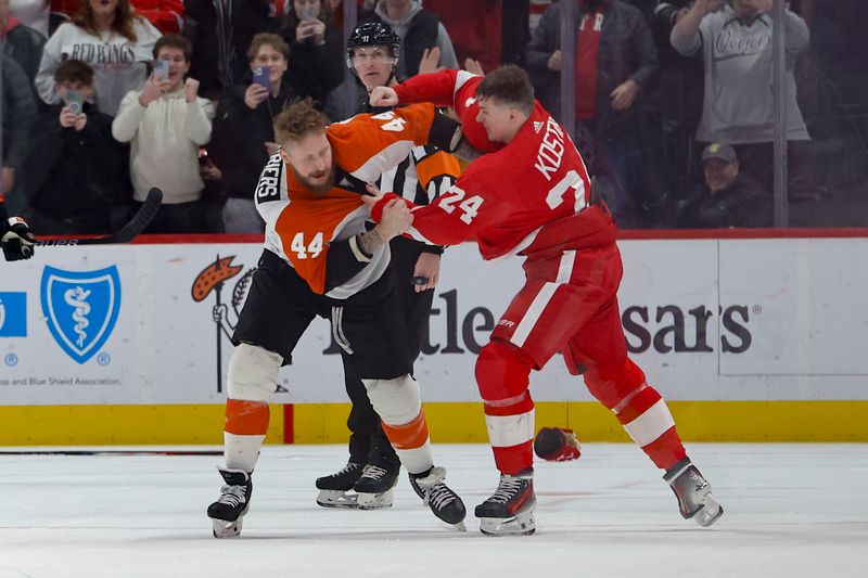 Jan 25, 2024; Detroit, Michigan, USA;  Philadelphia Flyers left wing Nicolas Deslauriers (44) and Detroit Red Wings center Klim Kostin (24) fight in the second period at Little Caesars Arena. Mandatory Credit: Rick Osentoski-USA TODAY Sports