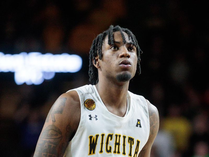 Jan 14, 2023; Wichita, Kansas, USA; Wichita State Shockers guard Jaykwon Walton (10) shoots a free throw during the second half against the Tulsa Golden Hurricane at Charles Koch Arena. Mandatory Credit: William Purnell-USA TODAY Sports