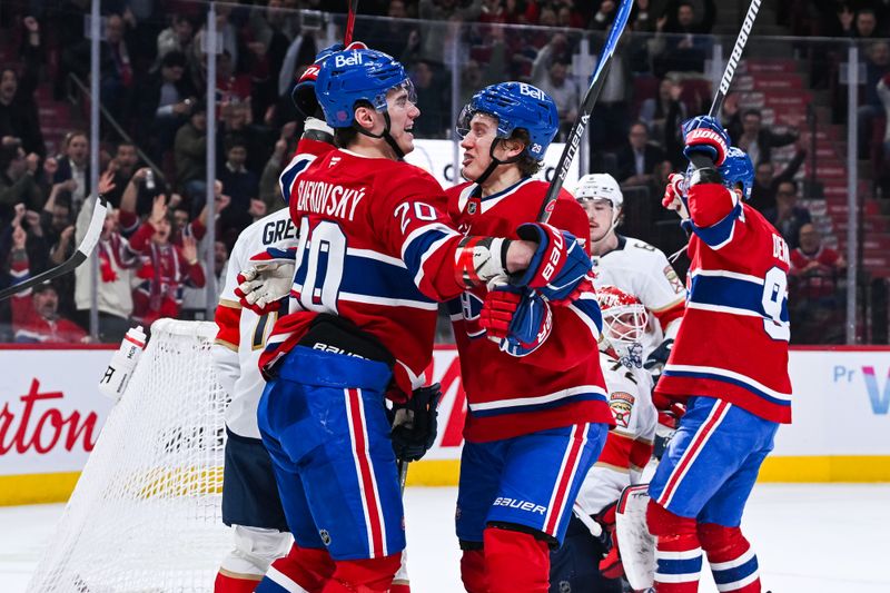 Jan 8, 2026; Montreal, Quebec, CAN; Montreal Canadiens center Oliver Kapanen (91) celebrates with left wing Juraj Slafkovsky (20) his goal against the Florida Panthers during the first period at Bell Centre. Mandatory Credit: David Kirouac-Imagn Images