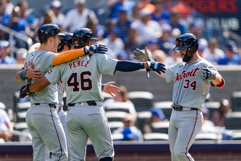 Jul 20, 2024; Toronto, Ontario, CAN; Detroit Tigers catcher Jake Rogers (34) celebrates his home run against the Toronto Blue Jays during the sixth inning with teammates at Rogers Centre. Mandatory Credit: Kevin Sousa-USA TODAY Sports