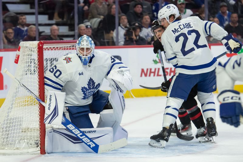 Dec 7, 2023; Ottawa, Ontario, CAN; Toronto Maple Leafs goalie Joseph Woll (60) follows the puck in the first period against the Ottawa Senators at the Canadian Tire Centre. Mandatory Credit: Marc DesRosiers-USA TODAY Sports