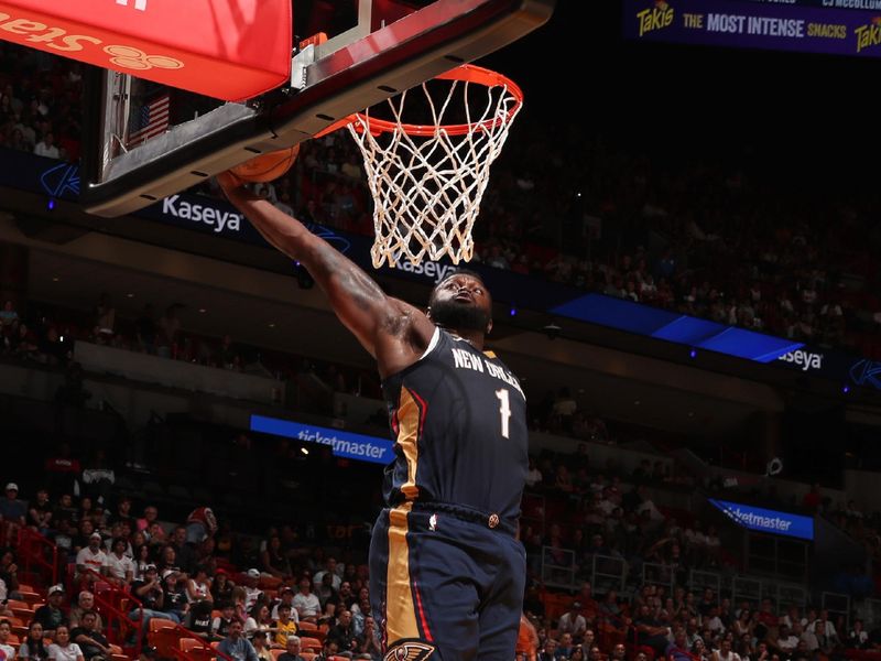 MIAMI, FL - OCTOBER 13: Zion Williamson #1 of the New Orleans Pelicans dunks the ball during the game Atlanta Hawks during a NBA pre season game on October 13, 2024 at Kaseya Center in Miami, Florida. NOTE TO USER: User expressly acknowledges and agrees that, by downloading and or using this Photograph, user is consenting to the terms and conditions of the Getty Images License Agreement. Mandatory Copyright Notice: Copyright 2024 NBAE (Photo by Issac Baldizon/NBAE via Getty Images)