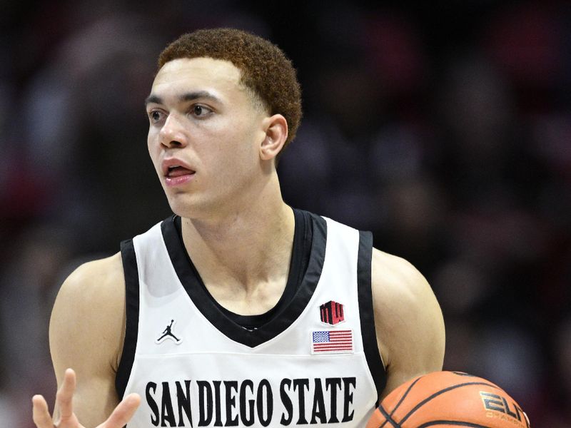 Nov 27, 2023; San Diego, California, USA; San Diego State Aztecs forward Elijah Saunders (25) controls the ball during the second half against the Point Loma Nazarene Sea Lions at Viejas Arena. Mandatory Credit: Orlando Ramirez-USA TODAY Sports