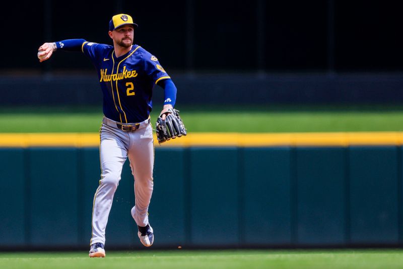 Jun 4, 2025; Cincinnati, Ohio, USA; Milwaukee Brewers second baseman Brice Turang (2) throws to first to get Cincinnati Reds third baseman Santiago Espinal (not pictured) out in the eighth inning at Great American Ball Park. Mandatory Credit: Katie Stratman-Imagn Images