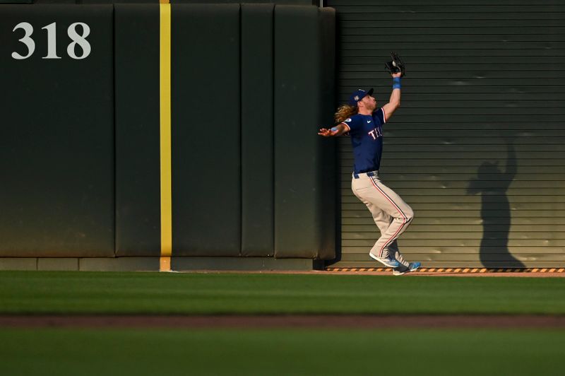 Jun 28, 2024; Baltimore, Maryland, USA;  Texas Rangers outfielder Travis Jankowski (16) runs down Baltimore Orioles first baseman Ryan Mountcastle (not pictured) first inning fly ball at Oriole Park at Camden Yards. Mandatory Credit: Tommy Gilligan-USA TODAY Sports