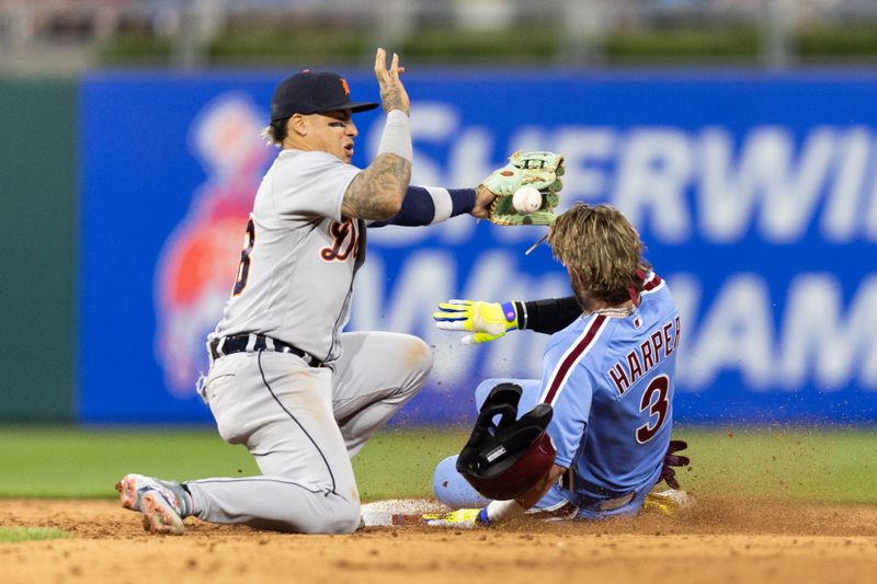 Jun 8, 2023; Philadelphia, Pennsylvania, USA; Philadelphia Phillies designated hitter Bryce Harper (3) slides into second past Detroit Tigers shortstop Javier Baez (28) for a double during the ninth inning at Citizens Bank Park. Mandatory Credit: Bill Streicher-USA TODAY Sports