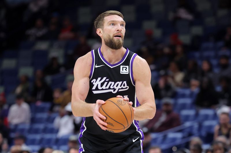 NEW ORLEANS, LOUISIANA - DECEMBER 12: Domantas Sabonis #11 of the Sacramento Kings shoots against the New Orleans Pelicans during a game at the Smoothie King Center on December 12, 2024 in New Orleans, Louisiana. NOTE TO USER: User expressly acknowledges and agrees that, by downloading and or using this Photograph, user is consenting to the terms and conditions of the Getty Images License Agreement. (Photo by Jonathan Bachman/Getty Images)