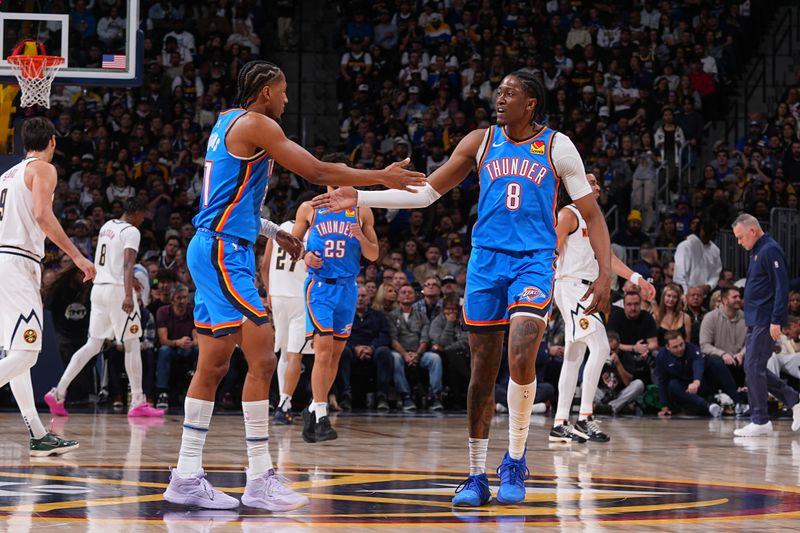 DENVER, CO - OCTOBER 24: Aaron Wiggins #21 and Jalen Williams #8 of the Oklahoma City Thunder high five during the game against the Denver Nuggets on October 24, 2024 at Ball Arena in Denver, Colorado. NOTE TO USER: User expressly acknowledges and agrees that, by downloading and/or using this Photograph, user is consenting to the terms and conditions of the Getty Images License Agreement. Mandatory Copyright Notice: Copyright 2024 NBAE (Photo by Bart Young/NBAE via Getty Images)