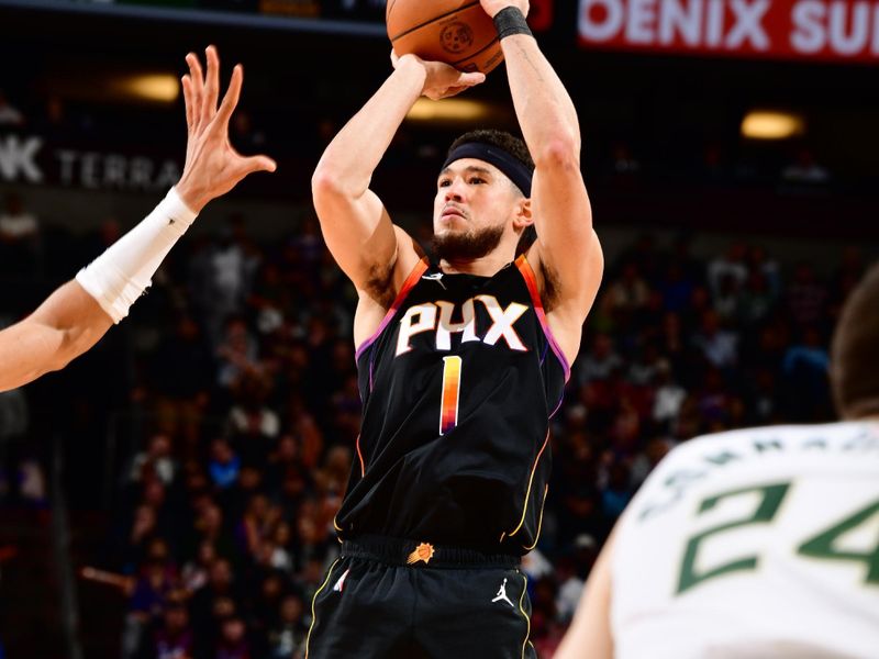 PHOENIX, AZ - FEBRUARY 6:  Devin Booker #1 of the Phoenix Suns shoots the ball during the game  on February 6, 2024 at Footprint Center in Phoenix, Arizona. NOTE TO USER: User expressly acknowledges and agrees that, by downloading and or using this photograph, user is consenting to the terms and conditions of the Getty Images License Agreement. Mandatory Copyright Notice: Copyright 2024 NBAE (Photo by Barry Gossage/NBAE via Getty Images)