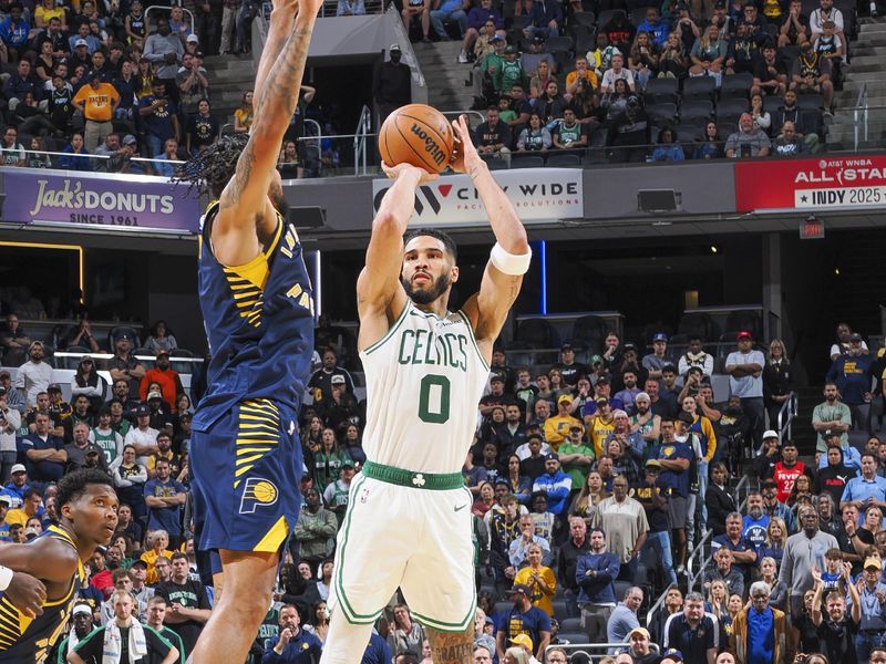 INDIANAPOLIS, IN - OCTOBER 30: Jayson Tatum #0 of the Boston Celtics shoots a three point basket during the game on October 30, 2024 at Gainbridge Fieldhouse in Indianapolis, Indiana. NOTE TO USER: User expressly acknowledges and agrees that, by downloading and or using this Photograph, user is consenting to the terms and conditions of the Getty Images License Agreement. Mandatory Copyright Notice: Copyright 2024 NBAE (Photo by Ron Hoskins/NBAE via Getty Images)