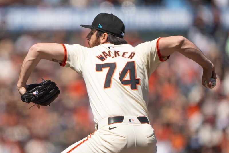 Jun 16, 2024; San Francisco, California, USA; San Francisco Giants relief pitcher Ryan Walker (74) pitches during the ninth inning against the Los Angeles Angels at Oracle Park. Mandatory Credit: Stan Szeto-USA TODAY Sports