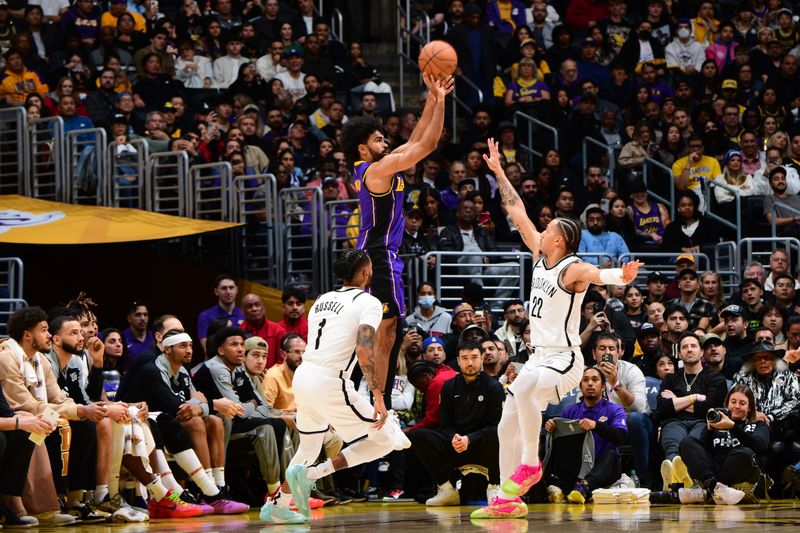 LOS ANGELES, CA - JANUARY 17: Gabe Vincent #7 of the Los Angeles Lakers shoots the ball during the game against the Boston Celtics on January 17, 2025 at Crypto.Com Arena in Los Angeles, California. NOTE TO USER: User expressly acknowledges and agrees that, by downloading and/or using this Photograph, user is consenting to the terms and conditions of the Getty Images License Agreement. Mandatory Copyright Notice: Copyright 2025 NBAE (Photo by Adam Pantozzi/NBAE via Getty Images)