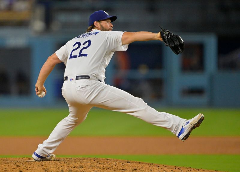 Aug 16, 2023; Los Angeles, California, USA;  Los Angeles Dodgers starting pitcher Clayton Kershaw (22) throws to the plate in the fourth inning against the Milwaukee Brewers at Dodger Stadium. Mandatory Credit: Jayne Kamin-Oncea-USA TODAY Sports