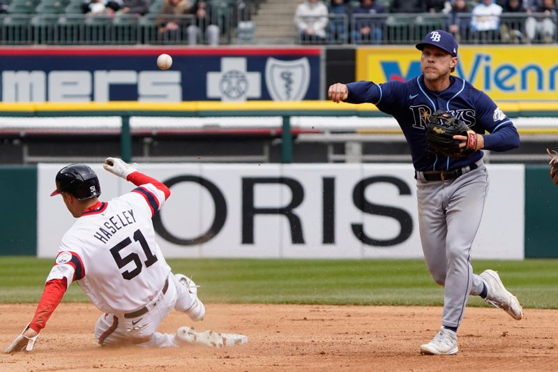 Apr 30, 2023; Chicago, Illinois, USA; Tampa Bay Rays shortstop Taylor Walls (6) forces out Chicago White Sox center fielder Adam Haseley (51) during the fourth inning at Guaranteed Rate Field. Mandatory Credit: David Banks-USA TODAY Sports