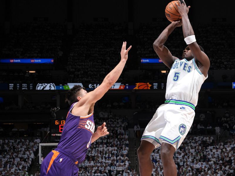 MINNEAPOLIS, MN -  APRIL 20: Anthony Edwards #5 of the Minnesota Timberwolves shoots the ball during Round One Game One of the 2024 NBA Playoffs against the Phoenix Suns on April 20, 2024 at Target Center in Minneapolis, Minnesota. NOTE TO USER: User expressly acknowledges and agrees that, by downloading and or using this Photograph, user is consenting to the terms and conditions of the Getty Images License Agreement. Mandatory Copyright Notice: Copyright 2024 NBAE (Photo by Jordan Johnson/NBAE via Getty Images)